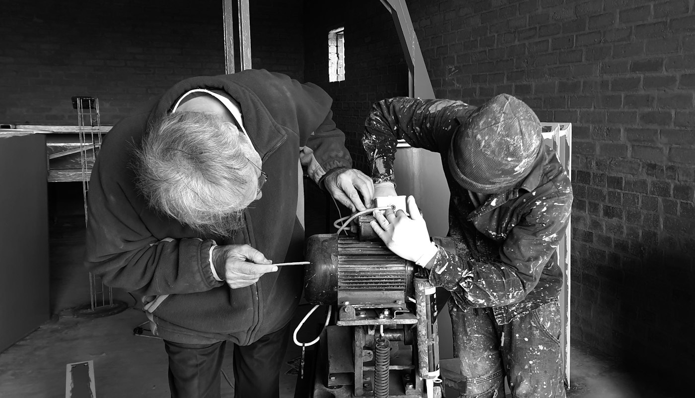 Technicians working on an air system